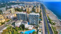 Продается квартира у моря в Алании за 165000 EUR с полной инфраструктурой