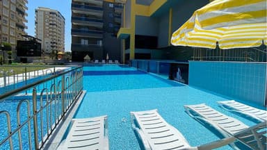 Продажа квартиры в Айдемир, Алания за 113,000 EUR с двумя бассейнами и сауной